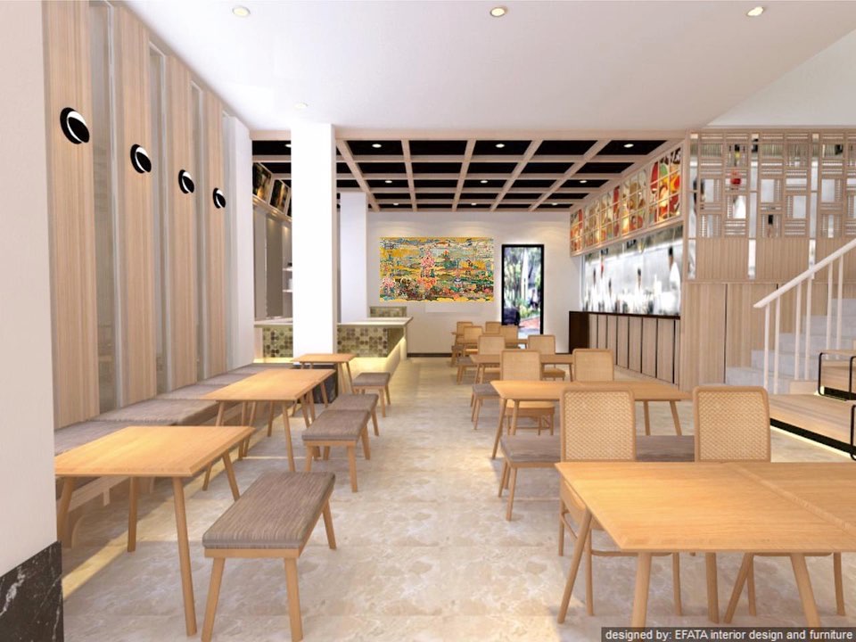 Interior kafe dengan meja kayu dan panel vertikal