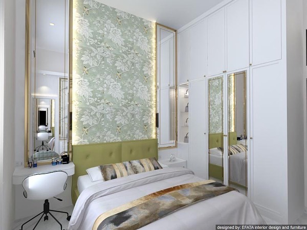 Sudut lain kamar tidur wallpaper bunga hijau dengan meja rias dan cermin